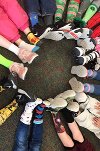 students feet in a circle